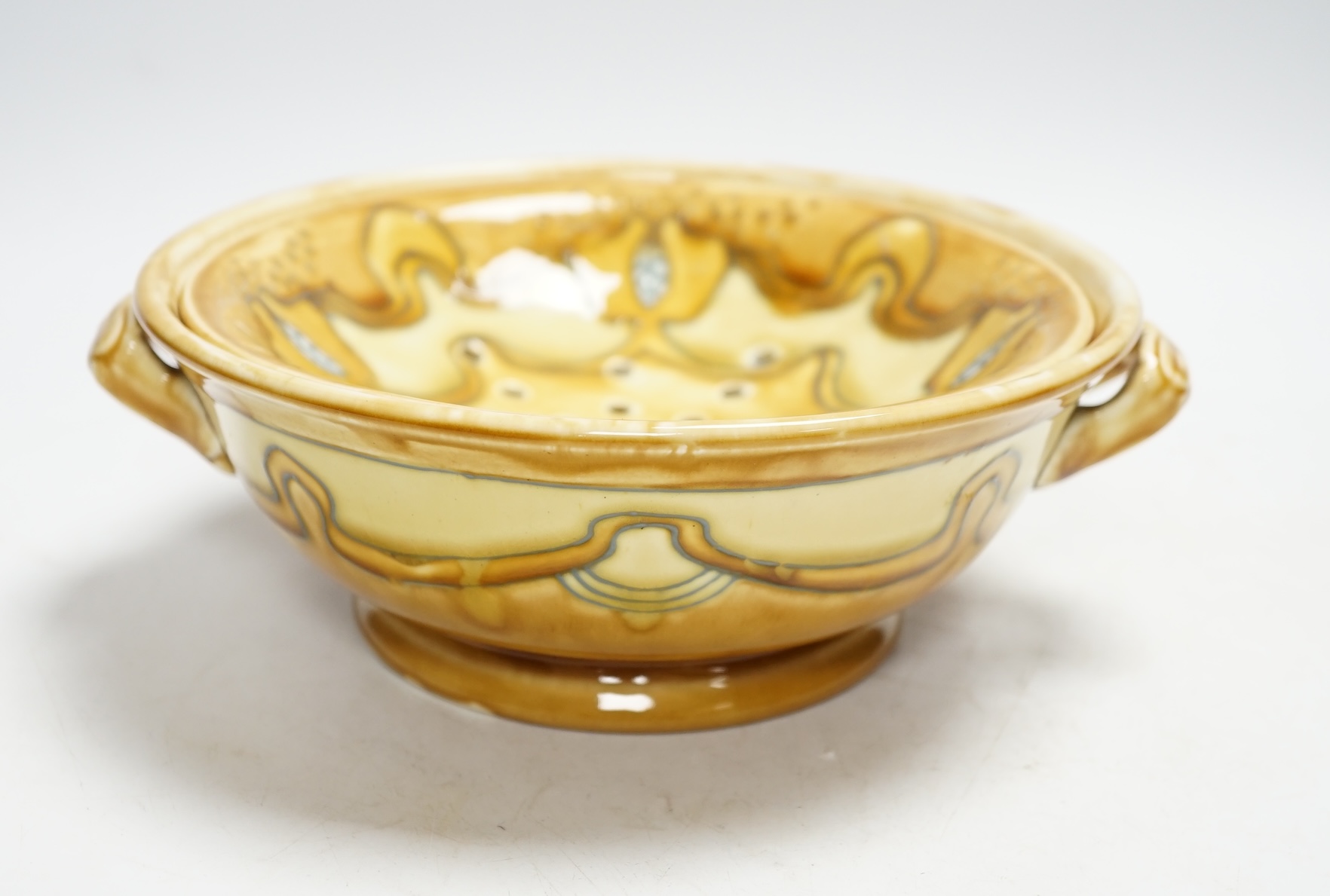 A Mintons Secessionist ware cress strainer dish, 21cm diameter